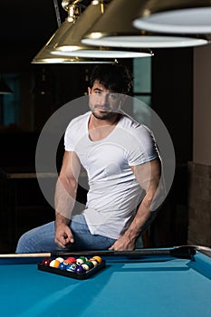 Smiling Happy Man Playing Billiard