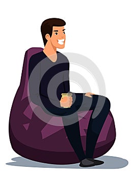 Smiling happy man sitting with takeaway coffee cup