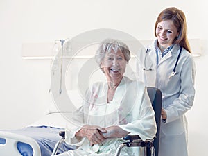 Smiling happy senior woman in a wheelchair