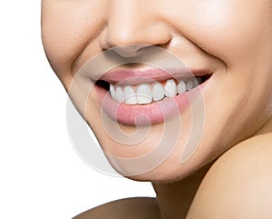 Smiling happy woman. Laughing female mouth with great teeth over white background. Healthy beautiful smile.