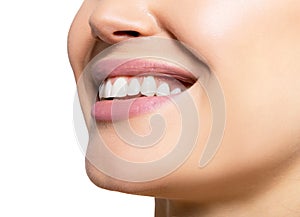 Smiling happy woman. Laughing female mouth with great teeth over white background. Healthy beautiful smile. Teeth health,