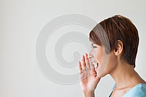 Smiling happy woman, speak, shout, announce, communicate photo