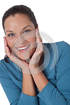 Smiling happy young woman in turquoise vest