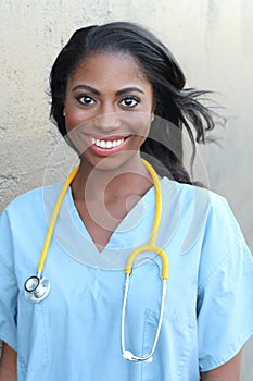 Smiling healthcare worker woman with stethoscope