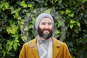 Smiling hipster bearded male student