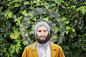 Smiling hipster bearded male student