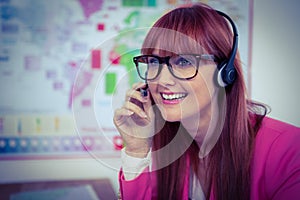 Smiling hipster businesswoman with headset