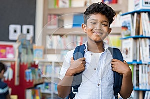 Smiling hispanic boy at school