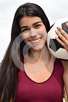 Smiling Hispanic Teen Athlete Female Soccer Player photo