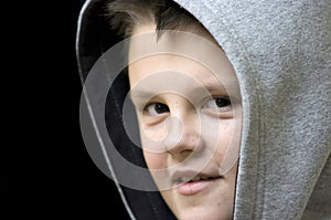 Smiling hooded boy