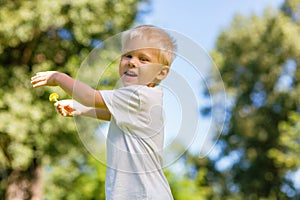 Smiling kid having fun in the park