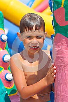 Smiling kid at a water park