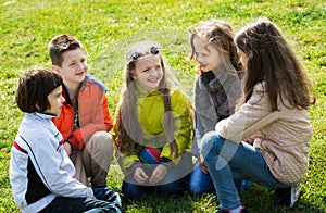 Smiling kids chatting outdoor