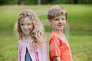 Smiling kids standing at the park