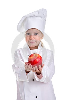 Smiling kind chef girl in a cap cook uniform, giving the red apple, stretching the arms. Human emotions, facial