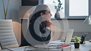 Smiling lady resting smartphone at luxury office closeup. Woman enjoying break