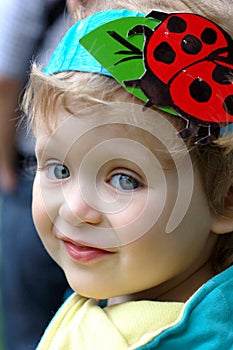 Smiling ladybird girl