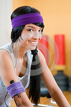 Smiling latin girl at gym