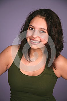 Smiling latina girl with braces