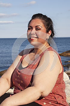 Smiling latina woman with great eye makeup