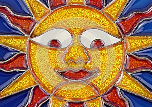 Smiling leaded glass sun face