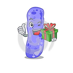 Smiling legionella cartoon character having a green gift box