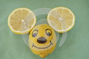 Smiling lemon mouse face.