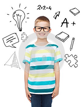 Smiling little boy in eyeglasses