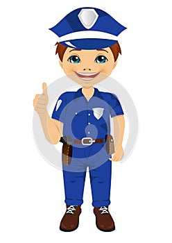 Smiling little boy wearing police uniform giving thumbs up