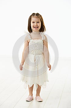 Smiling little girl in ballet costume
