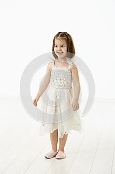 Smiling little girl in ballet costume