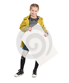 Smiling little girl with blank sheet in hands