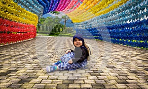 smiling little girl in the colorful hallway