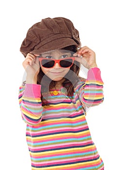 Smiling little girl in hat and sunglasses