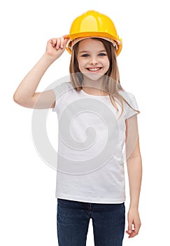 Smiling little girl in protective helmet