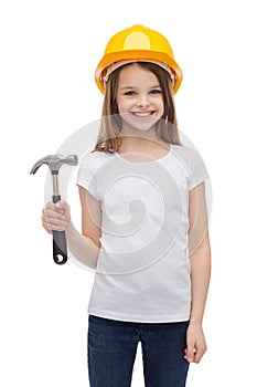 Smiling little girl in protective helmet