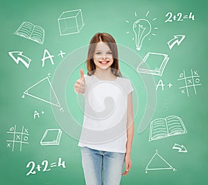 Smiling little girl in white blank t-shirt