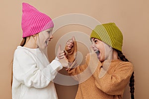 smiling little girls in hats studio childhood