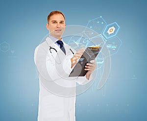 Smiling male doctor with clipboard and stethoscope