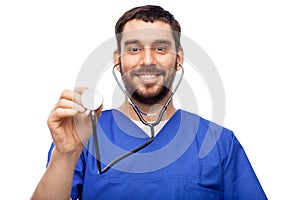 smiling male doctor or nurse with stethoscope