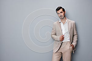 smiling man beige copyspace businessman happy suit business confident handsome portrait