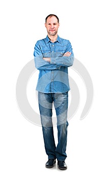 Smiling man in denim shirt isolated on the white background