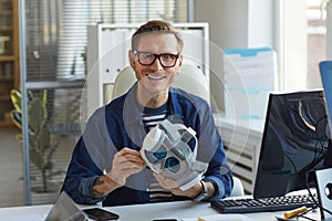 Smiling Man Developing VR Software