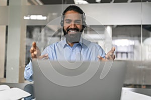 Smiling man gesturing in video call