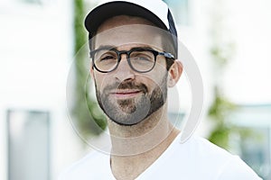 Smiling man in glasses