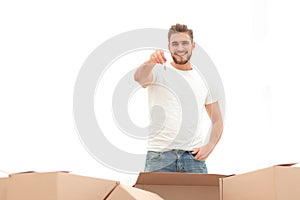Smiling man holding the keys of new apartments