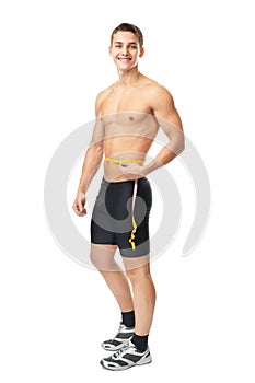 Smiling man measuring waist