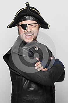 Smiling man in a pirate costume