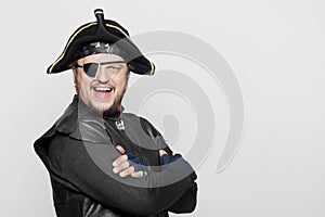 Smiling man in a pirate costume