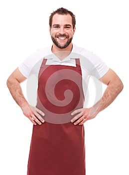 Smiling man with red apron